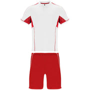 Conjunto deportivo unisex con combinación de tres tejidos, camiseta con cuello mao y apertura mediante broche de presión, interior de la manga en tejido transpirable y paneles laterales Vetonek Vetonek