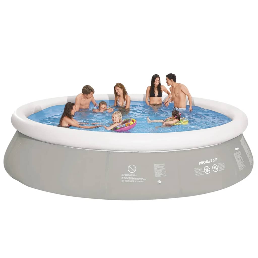 Piscina inflable redonda gris de 450x122 cm ideal para jardines y actividades al aire libre.