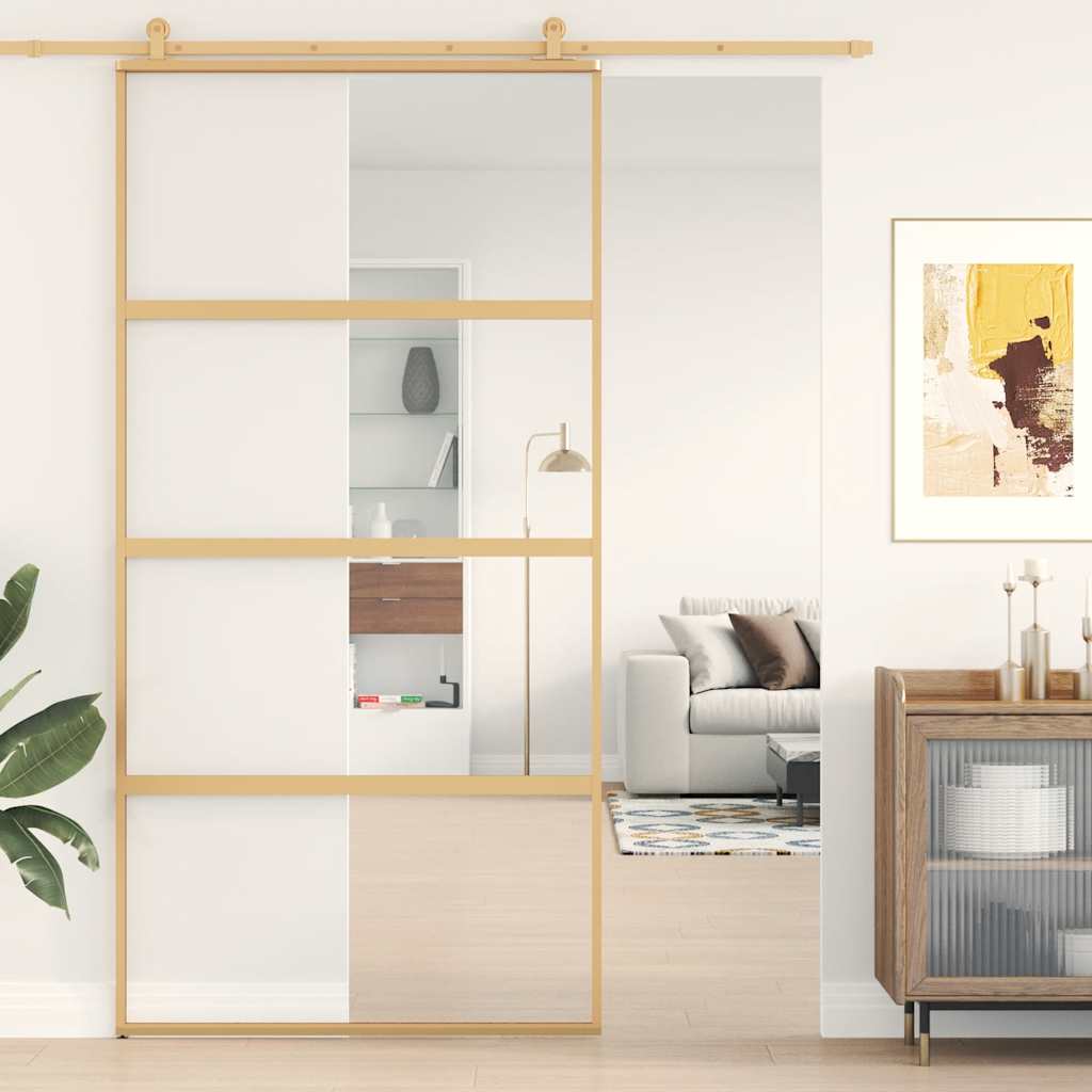 Porte coulissante dorée en verre ESG transparent et aluminium 