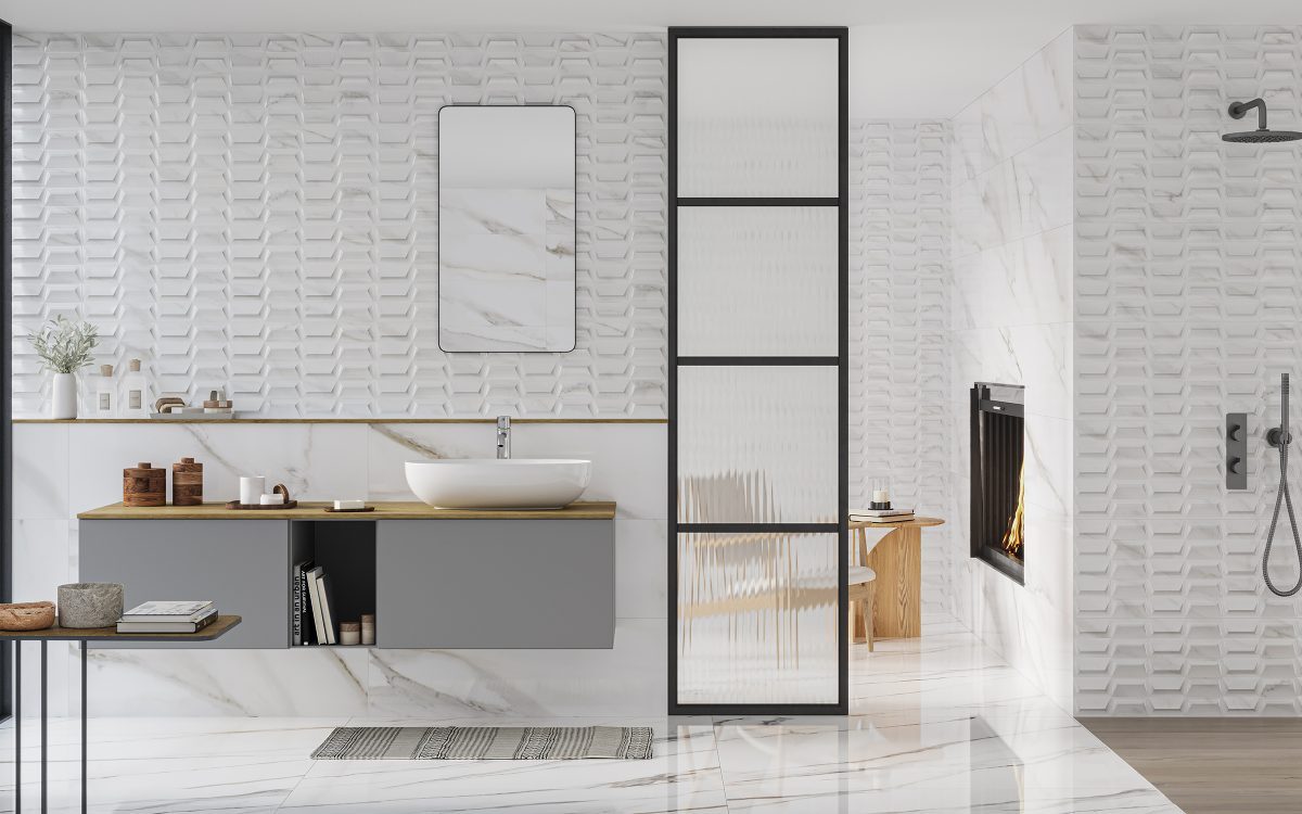 Carrara Relieve Velvet 33x100 en baño