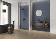 Pau Blue Grey con Relieve Mahon en baño