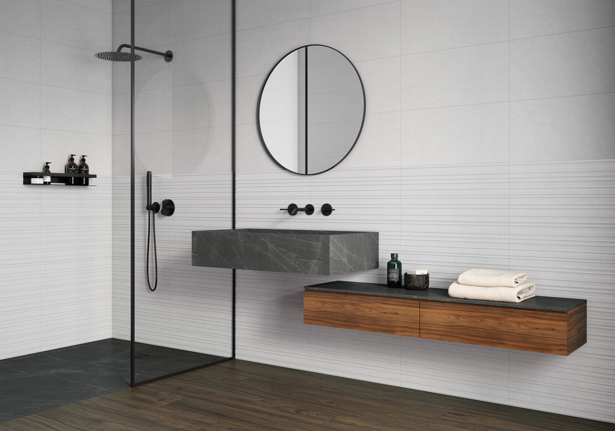 Pau Perla 30x60 con Relieve Mahon en baño