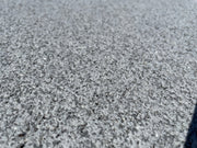 Losas de granito para jardín, ideales para crear caminos y espacios decorativos en exteriores.