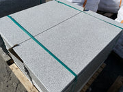 Losas de granito para jardín, ideales para crear caminos y áreas decorativas en exteriores.