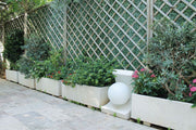 Jardinera Ojacastro en jardín clásico
