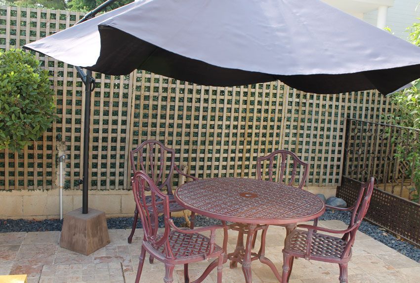 Pie de Sombrilla Baños en terraza
