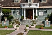 Fachada de vivienda revestida con paneles de piedra natural Miranda en verde